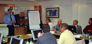 Martin Cole running a live trading course in Spain — real money, no simulations